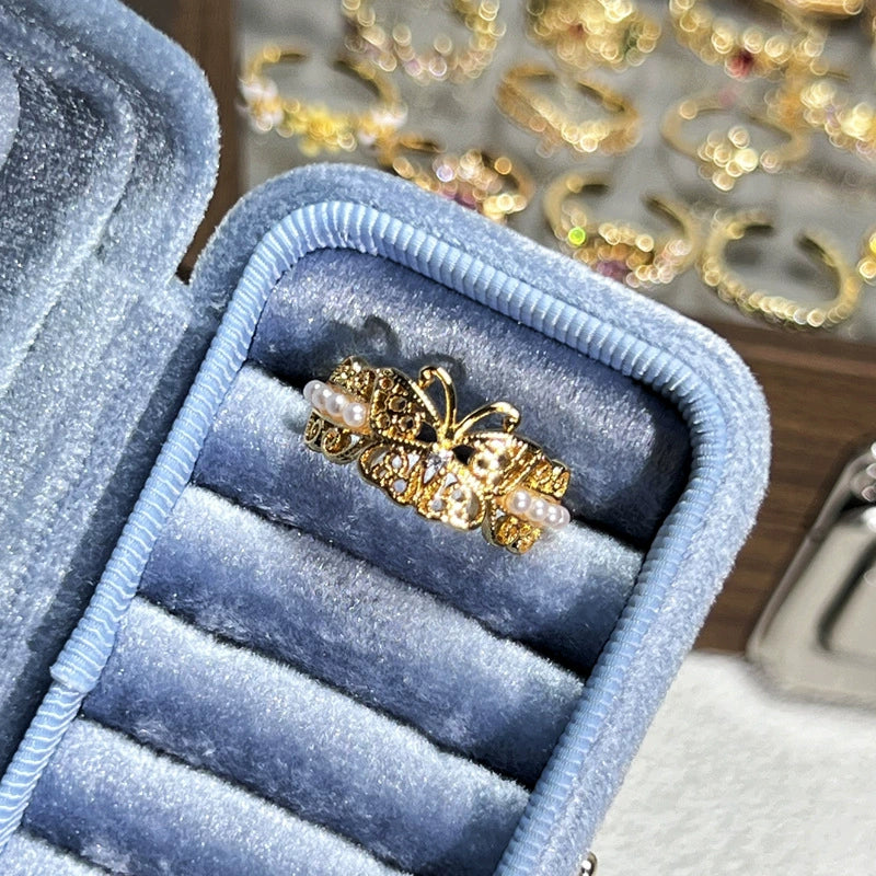 Elegant Gold Butterfly Ring with Pearl Accents