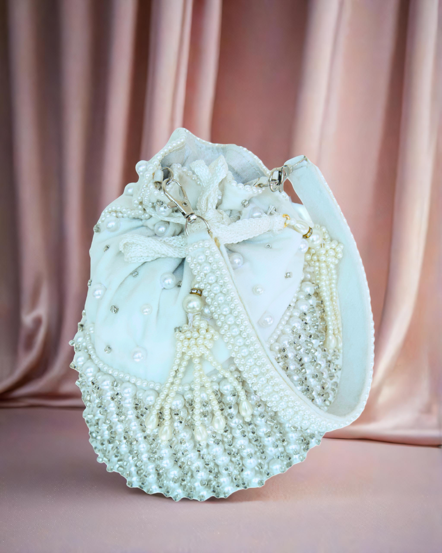Velvet pearl and stone work Potli with latches