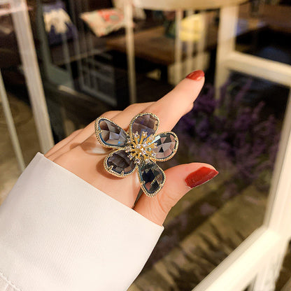 Elegant Crystal Flower Brooch with Diamond Accents