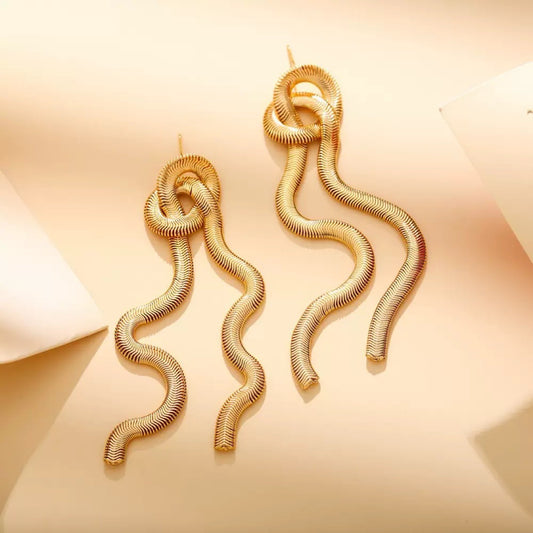 The Serpentine Knot Statement Earrings | Sculptural Tassel Jewelry