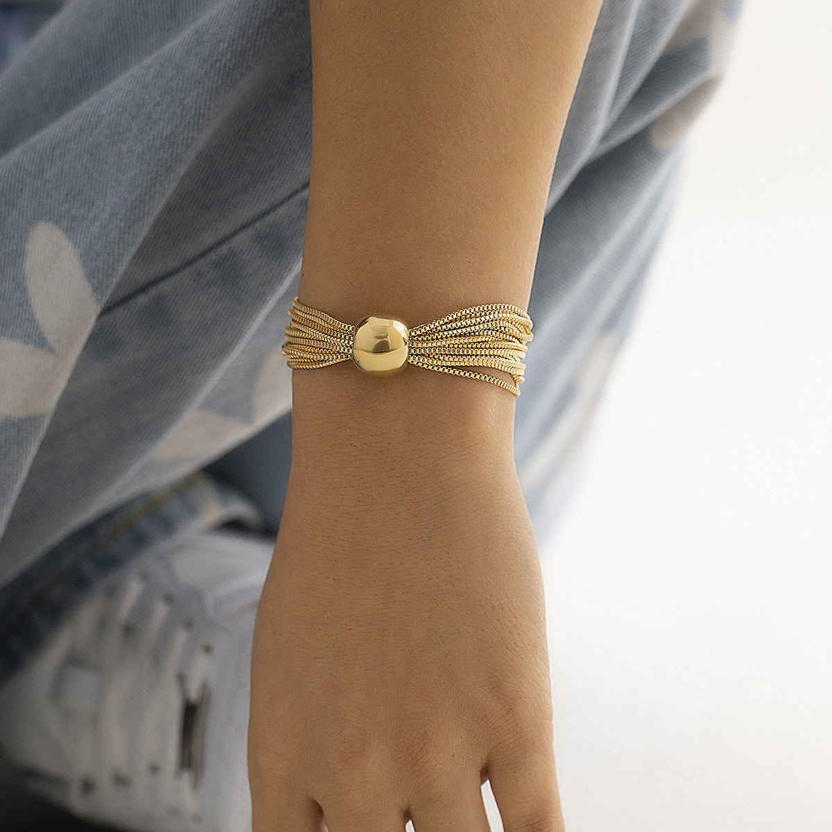 Chic Gold Multi-Strand Chain Bracelet with Statement Bead