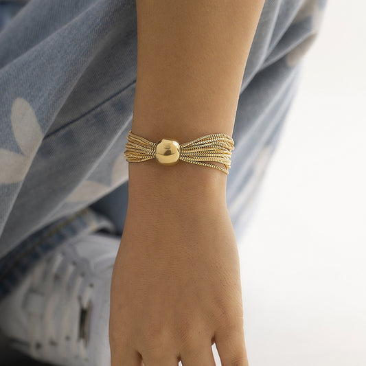 Chic Gold Multi-Strand Chain Bracelet with Statement Bead