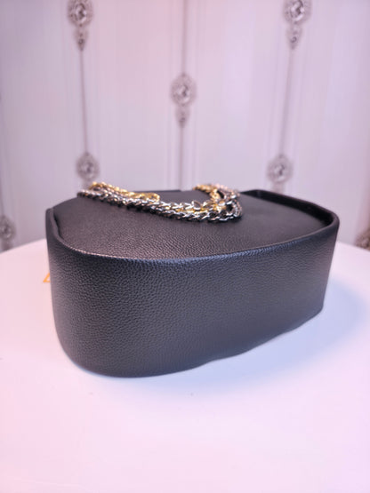 Black shiny handbag