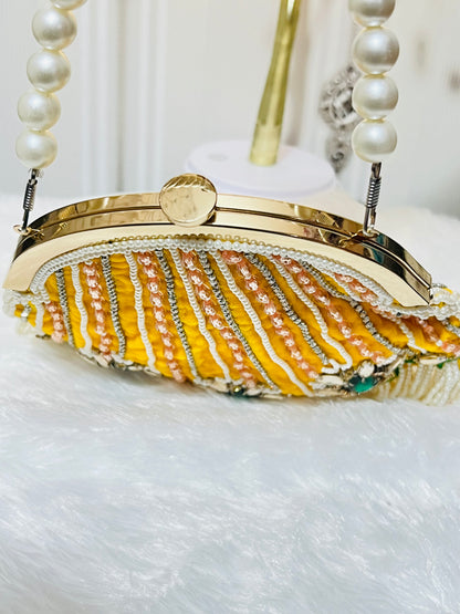 Pearl Tessle oval clutch with pearl sling