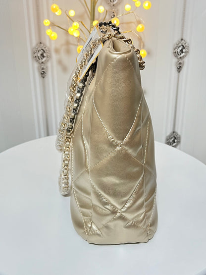 Quilted large handbag with metallic sling