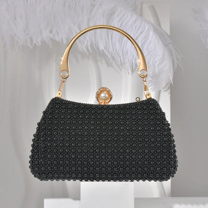 Pearl/beads handled party clutch