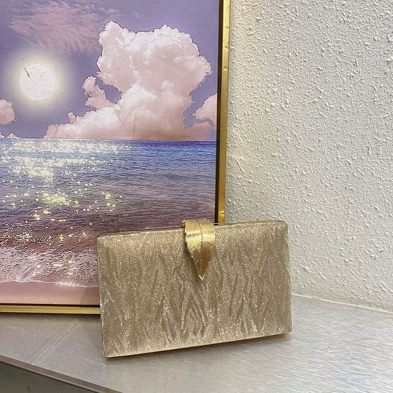 Elegant Shimmer Evening Clutch Bag with Gold Leaf Clasp