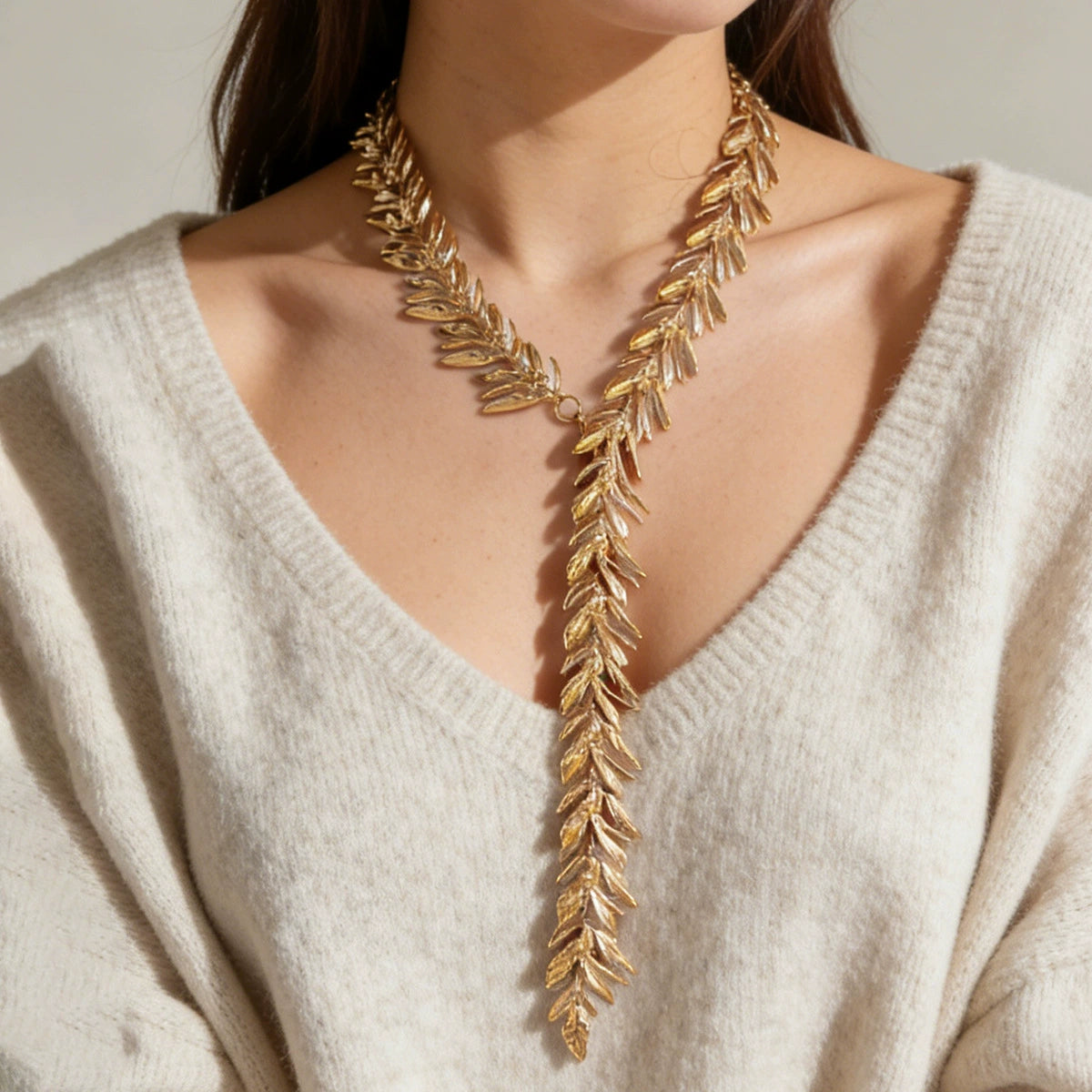 Elegant Gold Leaf Design Lariat Necklace