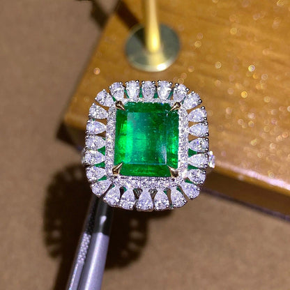Adjustable Elegant Emerald & Diamond Halo Ring | Exquisite Gold Design