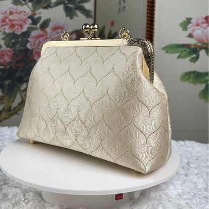Elegant Embroidered Silk Clutch Bag with Vintage Kiss-Lock Frame