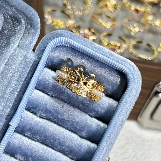 Elegant Gold Butterfly Ring with Pearl Accents