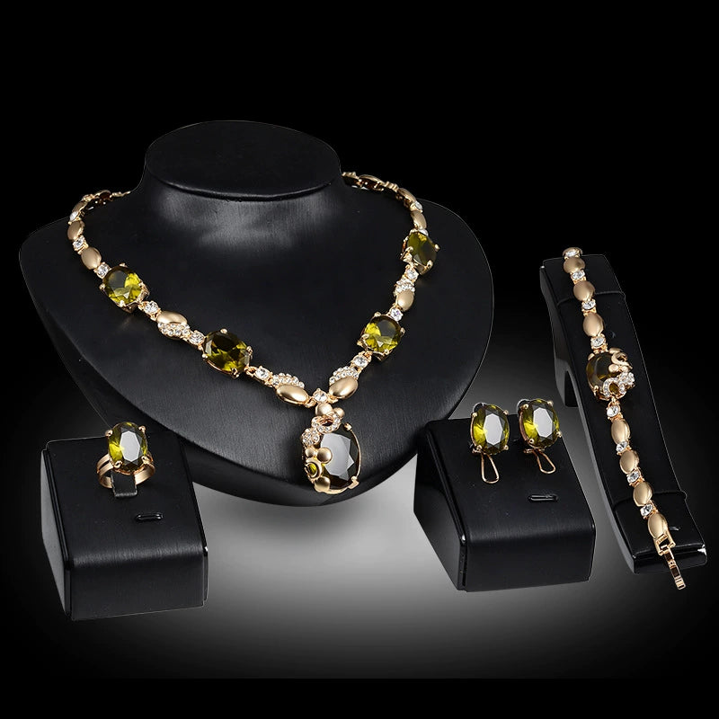 Elegant Gold Tone Green Crystal 4-Piece Jewelry Set