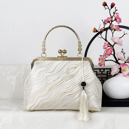 Elegant Embroidered Silk Clutch Bag with Vintage Kiss-Lock Frame