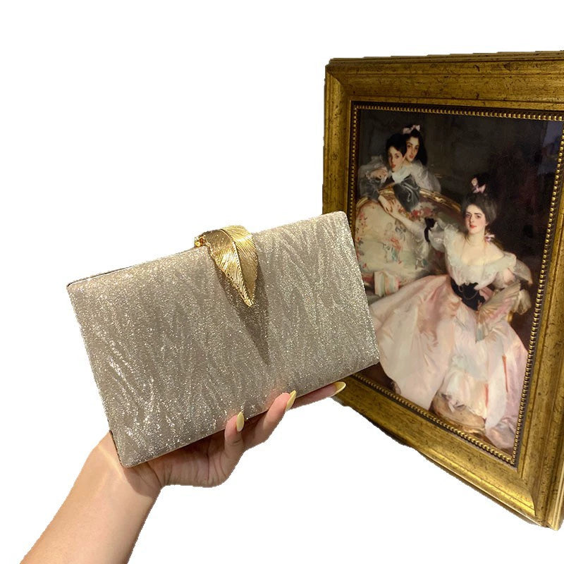 Elegant Shimmer Evening Clutch Bag with Gold Leaf Clasp