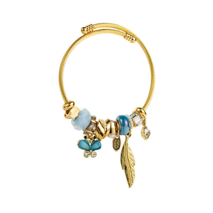 Whimsical Gold & Blue Charm Bracelet Butterfly Feather