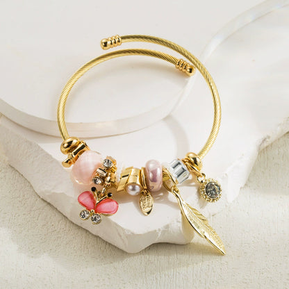 Whimsical Gold & Blue Charm Bracelet Butterfly Feather