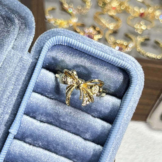 Adjustable Elegant Gold Bow Ring with Pave Zirconia