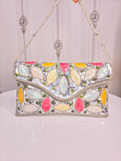Party wear Multi coloured leaves designed stone embroidered clutch